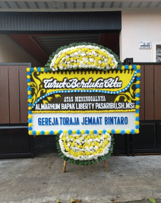 Papan Bunga Duka di Pakowa